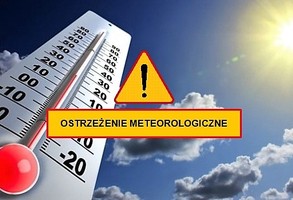 Słońce, termometr oraz napis ostrzeżenie meteorologiczne